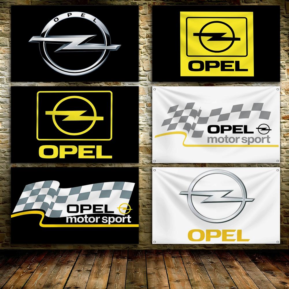 Flaga z metalowym logo O-Opels – Outdoor Sport Background recenzja i cena
